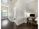 Hallway features a view into the bedroom and an office nook with hardwood floors at 2769 Rivertowne Pkwy, Mount Pleasant, SC 29466