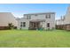 Spacious backyard with well-maintained lawn and a cozy pergola, perfect for outdoor entertaining and relaxation at 281 Decatur Dr, Summerville, SC 29486