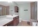 Bathroom featuring double sinks, a shower, and tile flooring, offering both functionality and style at 281 Decatur Dr, Summerville, SC 29486