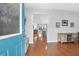 Inviting entryway with hardwood floors leading into a living space and a bright blue front door at 281 Decatur Dr, Summerville, SC 29486