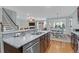 Open-concept kitchen featuring granite countertops and stainless steel appliances at 281 Decatur Dr, Summerville, SC 29486