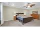 A well-lit main bedroom with a decorative ceiling fan, carpet floors, and ample space for furniture at 281 Decatur Dr, Summerville, SC 29486