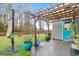 Cozy outdoor patio with a pergola, perfect for entertaining and relaxation at 281 Decatur Dr, Summerville, SC 29486