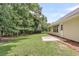 Spacious backyard with a concrete patio and lush green lawn at 2844 Curran Pl, Mount Pleasant, SC 29466