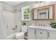 Traditional bathroom with vanity, tub/shower combo, and window providing natural light at 2844 Curran Pl, Mount Pleasant, SC 29466