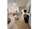 Comfortable living space with a fireplace, open layout, and views into the kitchen at 2844 Curran Pl, Mount Pleasant, SC 29466