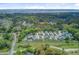 Aerial view of charming neighborhood surrounded by lush greenery, pond, with convenient road access at 2928 Tranquility Rd, Mount Pleasant, SC 29466