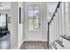 Inviting foyer with hardwood floors and glass paneled door at 2928 Tranquility Rd, Mount Pleasant, SC 29466