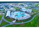 Aerial view of a vibrant community pool and recreation area with lush landscaping at 3 Clearblue Loop, Summerville, SC 29486