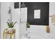Bright bathroom featuring soaking tub and shower with glass door and decorative plant at 3 Clearblue Loop, Summerville, SC 29486