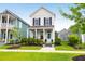 Charming two-story home features a light blue front door and inviting front porch, enhancing its curb appeal at 3 Clearblue Loop, Summerville, SC 29486