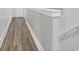Hallway with white walls and wooden floor at 3 Clearblue Loop, Summerville, SC 29486