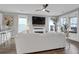Cozy living room with a fireplace, large windows, and comfortable seating at 3 Clearblue Loop, Summerville, SC 29486