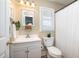 Bathroom featuring a vanity with storage, tiled floors, and shower at 30 Beachside Dr, Isle of Palms, SC 29451