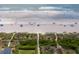 Expansive aerial view of the beach showing the coastline and the proximity to the ocean and community at 30 Beachside Dr, Isle of Palms, SC 29451