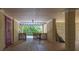 Spacious covered patio featuring a swing and lattice wall, leading to the backyard at 30 Beachside Dr, Isle of Palms, SC 29451