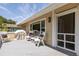 Outdoor deck with patio furniture, perfect for entertaining and relaxing at 30 Beachside Dr, Isle of Palms, SC 29451