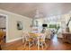 Open-concept living area with a dining table, comfortable seating, and abundant natural light at 30 Beachside Dr, Isle of Palms, SC 29451