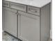 Bathroom vanity with light gray cabinets and a white countertop with storage at 3029 Robeson Trce, Johns Island, SC 29455