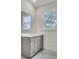 Modern bathroom with gray cabinets, marble floors, and stylish fixtures at 3029 Robeson Trce, Johns Island, SC 29455