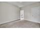 Spacious bedroom features neutral paint, carpet flooring, and a walk-in closet at 3029 Robeson Trce, Johns Island, SC 29455
