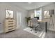 Bedroom featuring desk and artwork; an en suite bathroom is also visible at 3029 Robeson Trce, Johns Island, SC 29455