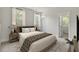 Comfortable bedroom with neutral tones, a large bed, and plenty of natural light at 3029 Robeson Trce, Johns Island, SC 29455