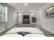 Spacious bedroom features neutral walls, a large bed, and ample natural light at 3029 Robeson Trce, Johns Island, SC 29455