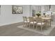 Bright dining room with a table set for six people, accented by natural light and a neutral palette at 3029 Robeson Trce, Johns Island, SC 29455