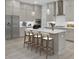 Bright, spacious kitchen with stainless steel appliances, a large island and pendant lighting at 3029 Robeson Trce, Johns Island, SC 29455