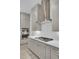 Modern kitchen with stainless steel appliances, quartz countertops, and herringbone backsplash at 3029 Robeson Trce, Johns Island, SC 29455