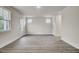 Open living area with natural light and wood flooring at 3029 Robeson Trce, Johns Island, SC 29455