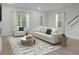 Well-lit living room with comfortable seating and open floor plan design at 3029 Robeson Trce, Johns Island, SC 29455