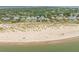 Aerial shot of beach houses surrounded by sandy dunes and overlooking the ocean at 3126-B Palmetto Blvd # 4, Edisto Island, SC 29438