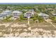 Beachfront houses sit elevated above sand dunes with ocean access, offering stunning views at 3126-B Palmetto Blvd # 4, Edisto Island, SC 29438