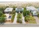 Aerial view of a gorgeous beach house nestled between lush greenery and sandy shores at 3126-B Palmetto Blvd # 4, Edisto Island, SC 29438