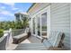 Balcony with chaise lounges offering a relaxing outdoor retreat at 3126-B Palmetto Blvd # 4, Edisto Island, SC 29438
