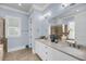 Spacious bathroom features a double vanity, tiled floors, and separate shower and tub at 3126-B Palmetto Blvd # 4, Edisto Island, SC 29438