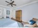 Bright bedroom featuring a ceiling fan, hardwood floors, and comfortable seating area at 3126-B Palmetto Blvd # 4, Edisto Island, SC 29438