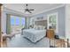 Inviting bedroom boasts ocean views and a comfortable layout with a woven headboard at 3126-B Palmetto Blvd # 4, Edisto Island, SC 29438