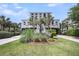 Charming two-story beach house with lush landscaping, driveway, and plenty of curb appeal at 3126-B Palmetto Blvd # 4, Edisto Island, SC 29438