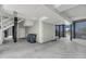 Spacious undercarriage featuring a concrete foundation with black beams, stairs, and exterior access at 3126-B Palmetto Blvd # 4, Edisto Island, SC 29438