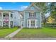 Charming two-story home featuring a quaint front porch and a neatly manicured lawn at 3152 Riverine, Charleston, SC 29414