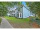 Two-story home featuring classic architecture and well-maintained landscaping at 3152 Riverine, Charleston, SC 29414
