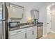 Efficient kitchenette features stainless steel appliances and granite countertops at 3152 Riverine, Charleston, SC 29414