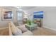 Comfortable living room with a large TV, skylight, and plenty of space to relax at 3152 Riverine, Charleston, SC 29414