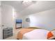 Bright bedroom featuring a TV on a stand, an air conditioner, and a chest of drawers at 337 Price St, Goose Creek, SC 29445