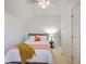 Bright bedroom with neutral walls, a comfortable bed, a lamp, and a side table at 337 Price St, Goose Creek, SC 29445