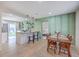 Bright dining area with a view to the Primary bedroom and kitchen with granite countertops at 337 Price St, Goose Creek, SC 29445