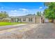 Traditional home featuring charming curb appeal with well-maintained landscaping, and a long driveway at 337 Price St, Goose Creek, SC 29445